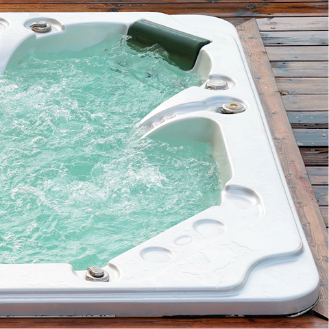 Hop into the private hot tub and unwind after an action-packed day