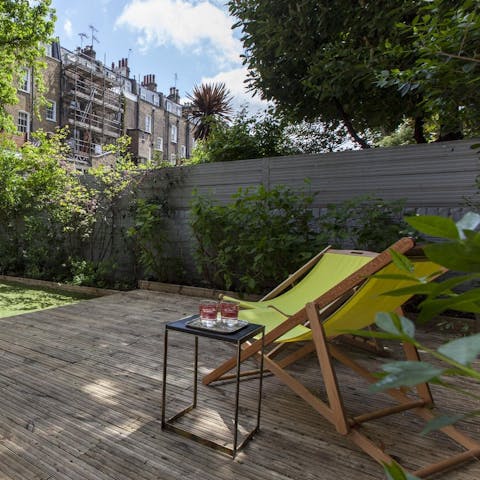 Enjoy an evening drink on the sun loungers