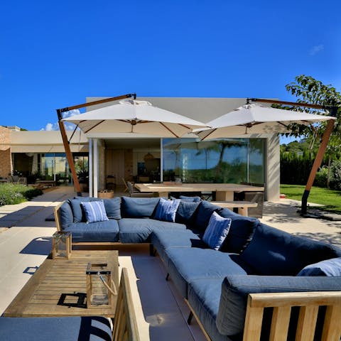 Gather around the outdoor living area for a bite to eat