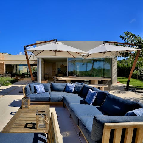 Gather around the outdoor living area for a bite to eat