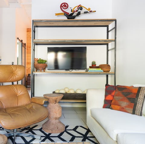Spend cosy evenings watching a movie in the design-led living space