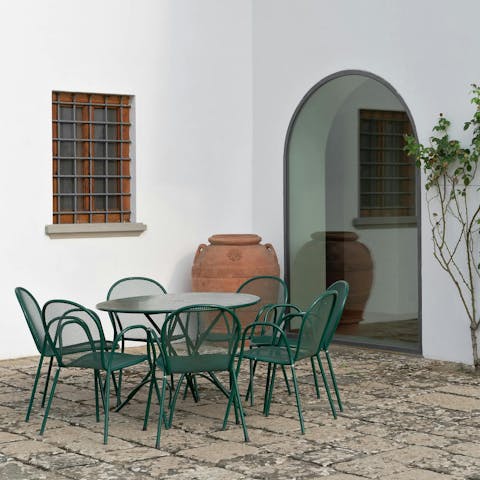 Dine alfresco around the outdoor table