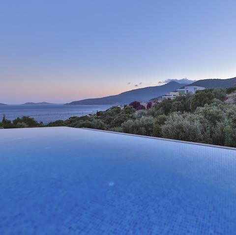 Take a midnight dip in the infinity pool