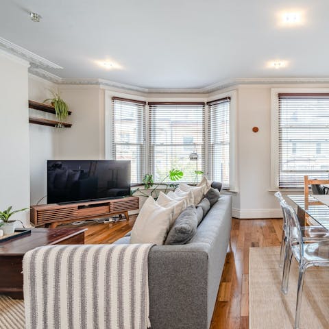Relax in the living room with a glass of wine after a busy day of sightseeing