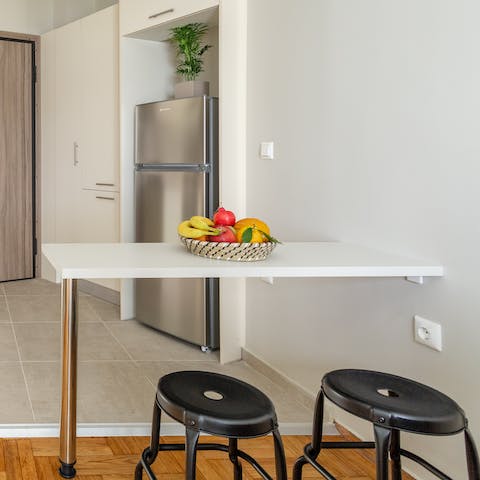 Serve up some fresh Greek fare from the local farmer's market – a fifteen-minute stroll away