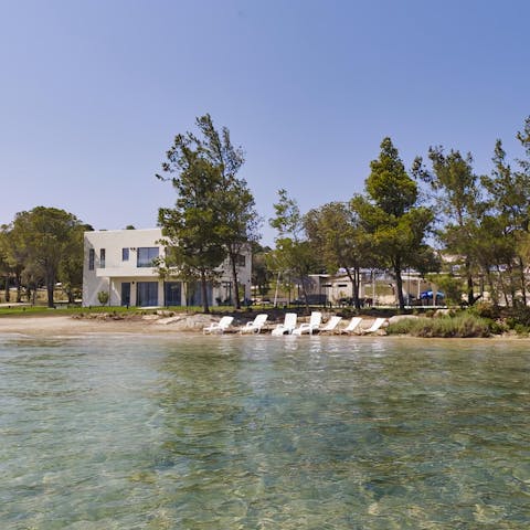 Wander down to the private beach and splash in the waves