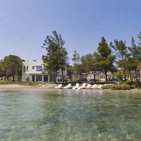 Wander down to the private beach and splash in the waves