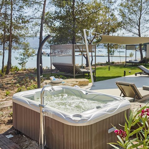 Stargaze in the evenings from the bubbling jacuzzi, a glass of wine in hand