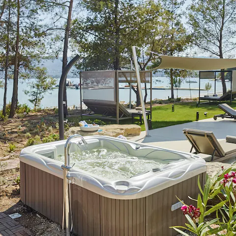 Stargaze in the evenings from the bubbling jacuzzi, a glass of wine in hand