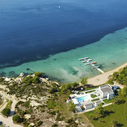 Stay on Diaporos Island, a small private isle just off the northern coast of Greece