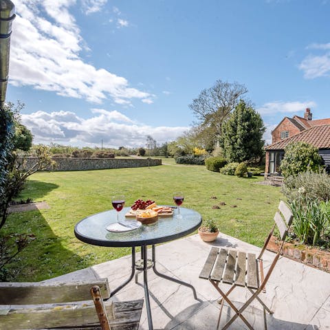 Enjoy a drink with bucolic views from the pretty patio