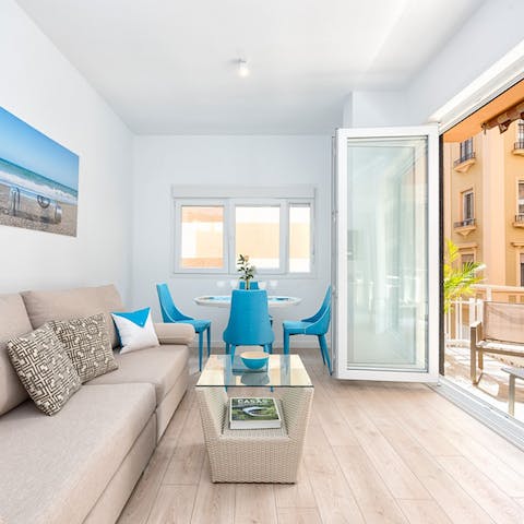 Throw open the large glass doors and add an alfresco feel to the living area