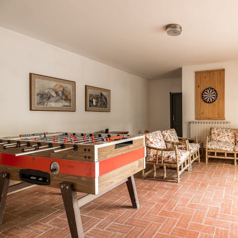Challenge your friends to a game of table football in the games room