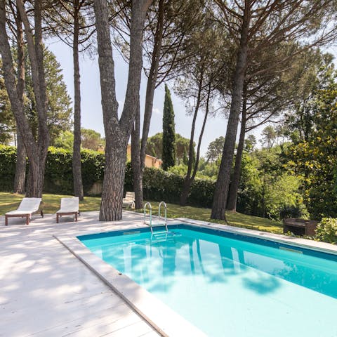 Relax in the sun loungers with a glass of wine after a few lengths in the pool