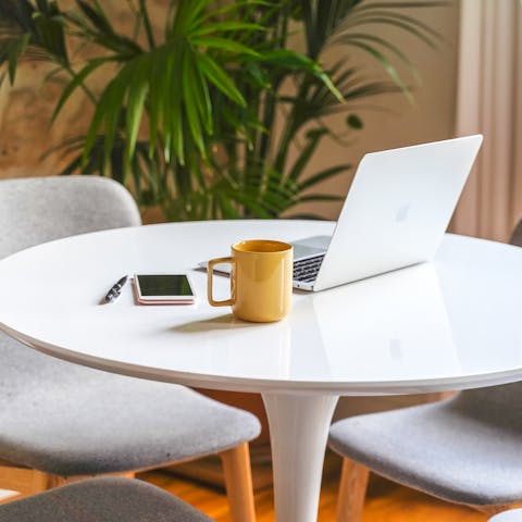 Work from home at the dining table in between Parisian adventures