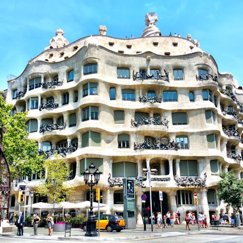 Explore lively Eixample's array of restaurants, bars and quirky architecture – Casa Milà is less than ten minutes away