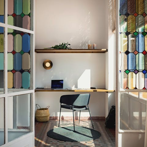 Get some work done in the bright and characterful desk area