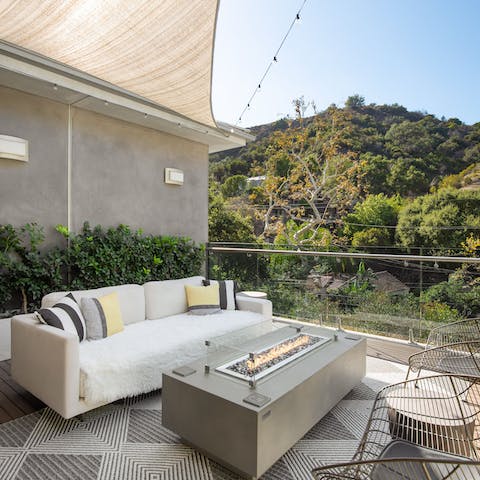 Light the fire pit and gather around with ice-cold drinks