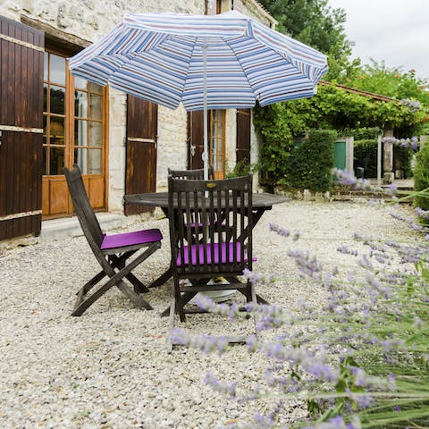 Nibble on French pastries and savour a coffee in the morning sun