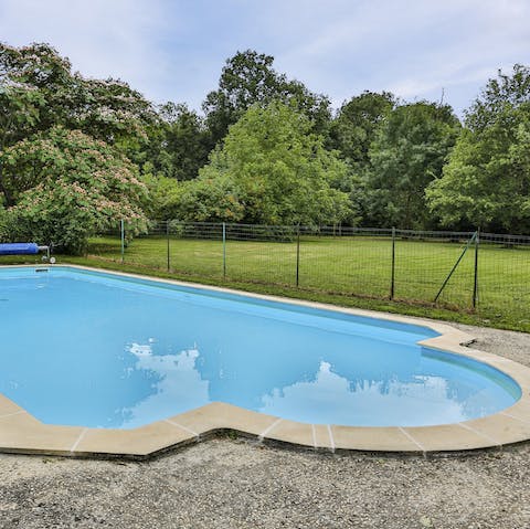 Spend sunny afternoons floating in the heated swimming pool