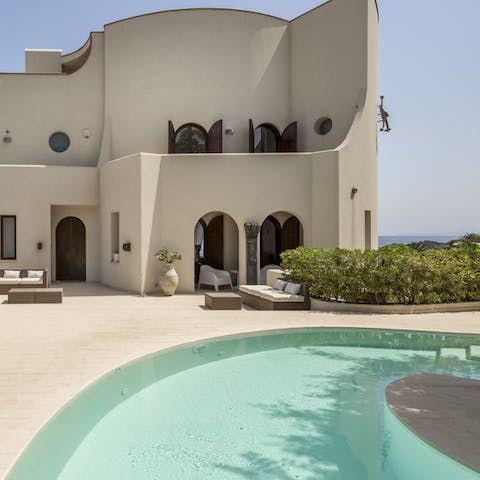 Cool down with a dip in the villa's private pool