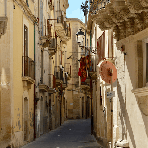Tour the streets of Catania in a scenic forty-minute drive from home