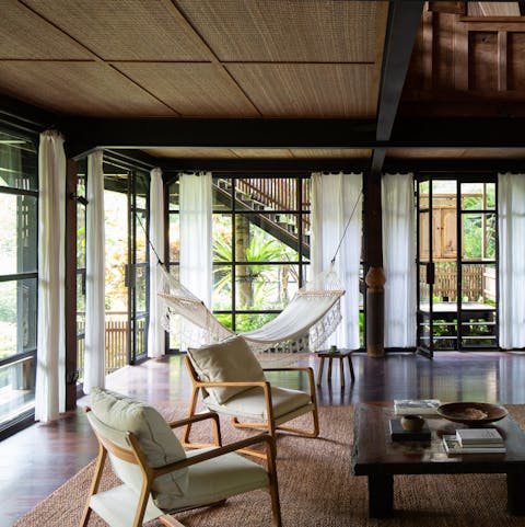 Enjoy jungle views while swaying in the hammock