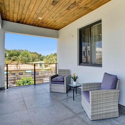 Take a break on the first-floor balcony, with lovely views over the garden