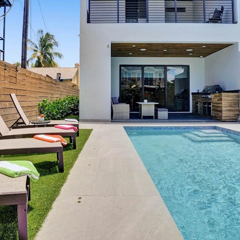 Spend lazy days soaking up the sun by the pool, padding in and out for snacks and drinks whenever you're running low