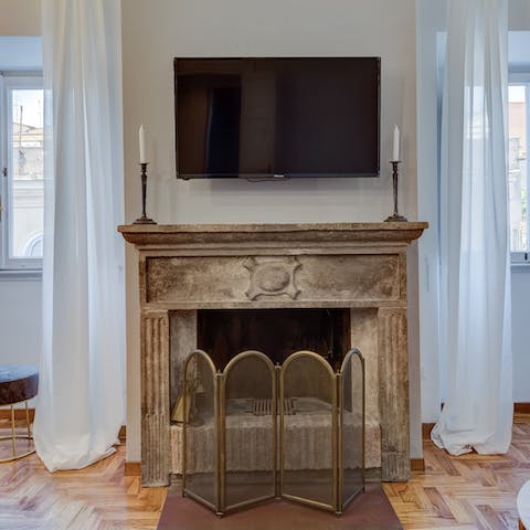 Marvel over the original stone fireplace as you eat lunch in the dining room