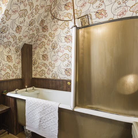 Unwind and soak in the elegant Victorian bathtub