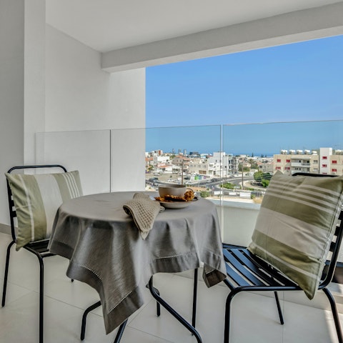 Savour your morning coffee with views across the city