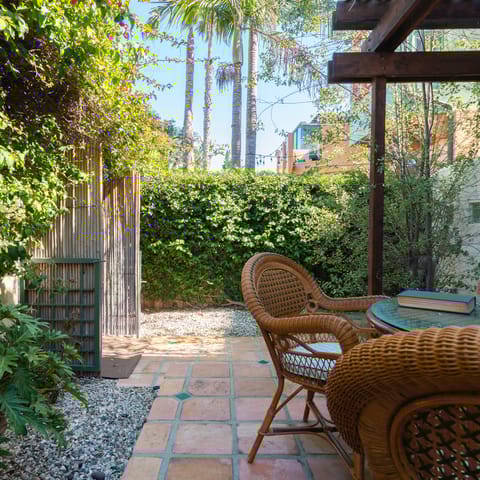 Leaves casting shade on the patio