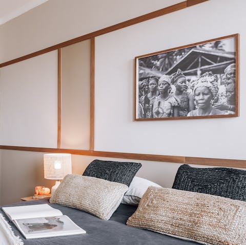 Relax with the home's black-and-white photographs as a backdrop