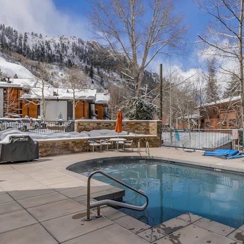 Cool off with a dip in the shared pool and hot tub