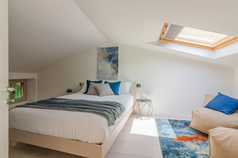 Sleep beneath a skylight as natural light pours in