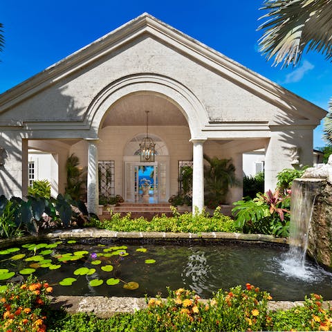 Take a stroll around the lush gardens and listen ti the waterfall trickle into the pond