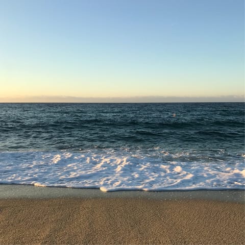 Pick your way across the pebbles of Platja de Guijarros, a short walk away