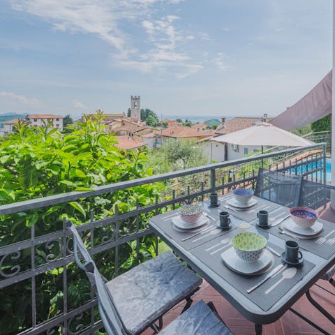 Admire the panoramic views on the balcony