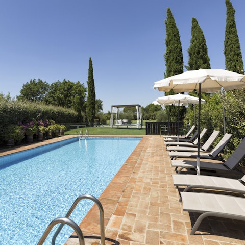 Experience a wonderful sense of relaxation whilst lounging by the pool