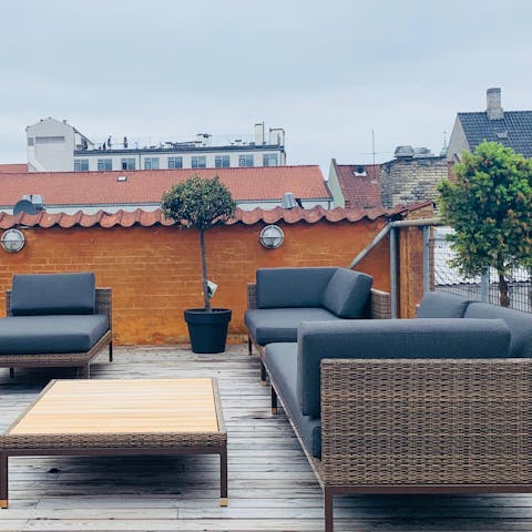 Enjoy a Danish elderflower drink on the private terrace