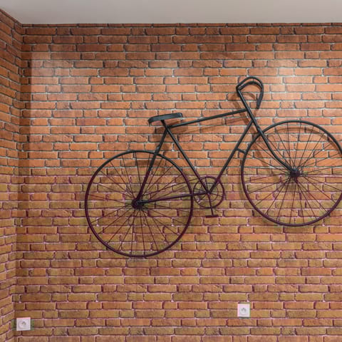 Admire the impressive art installations including the hanging bike