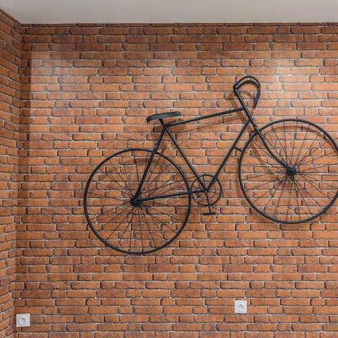 Admire the impressive art installations including the hanging bike