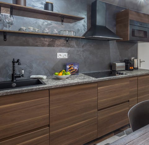 Cook up a home-made dinner paired with some local French wine in the sleek kitchen