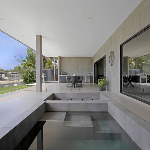 Wake up to a dip in the plunge pool, overlooking the water