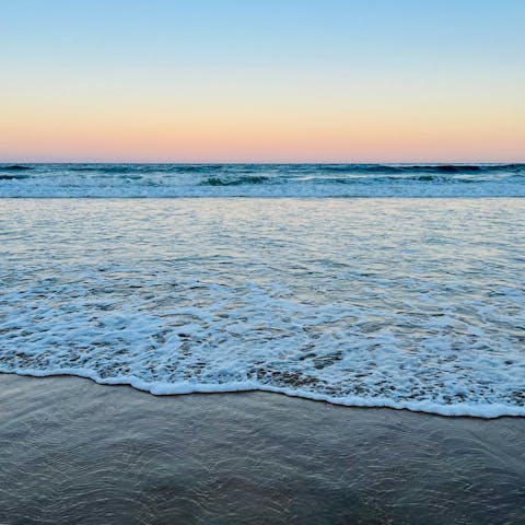 Catch the sunrise down at nearby Kurrawa Beach