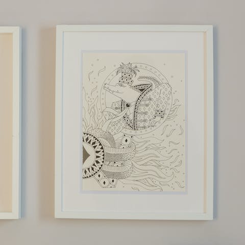 Admire the inky artworks on the walls