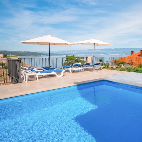 While away summer days in the private swimming pool, floating in the crystal-clear water