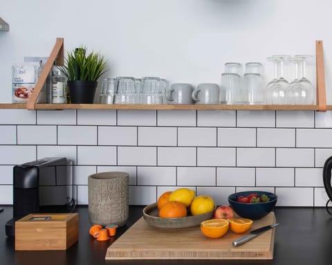 A Kitchen with sleek metro tiling