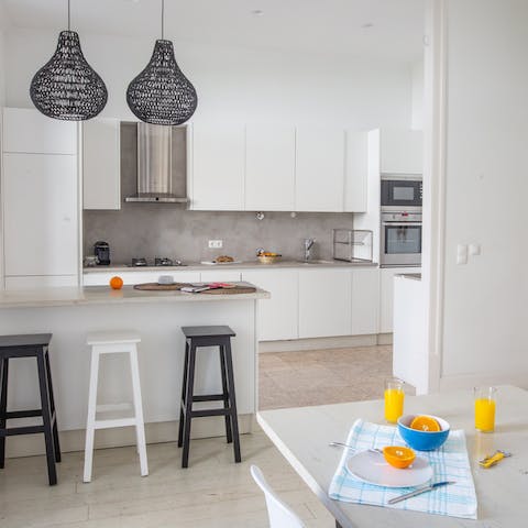 Entertain your group with ease in the sleek, open-plan kitchen